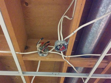 drop down electrical outlet from light box|installing junction box above electrical box.